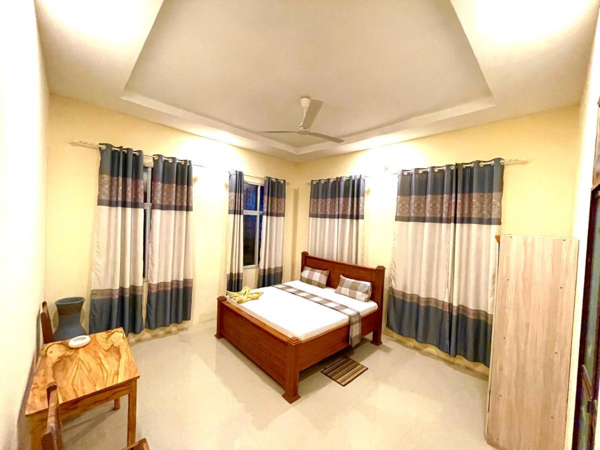 Garden Pearls Hotel นูงวี ภายนอก รูปภาพ