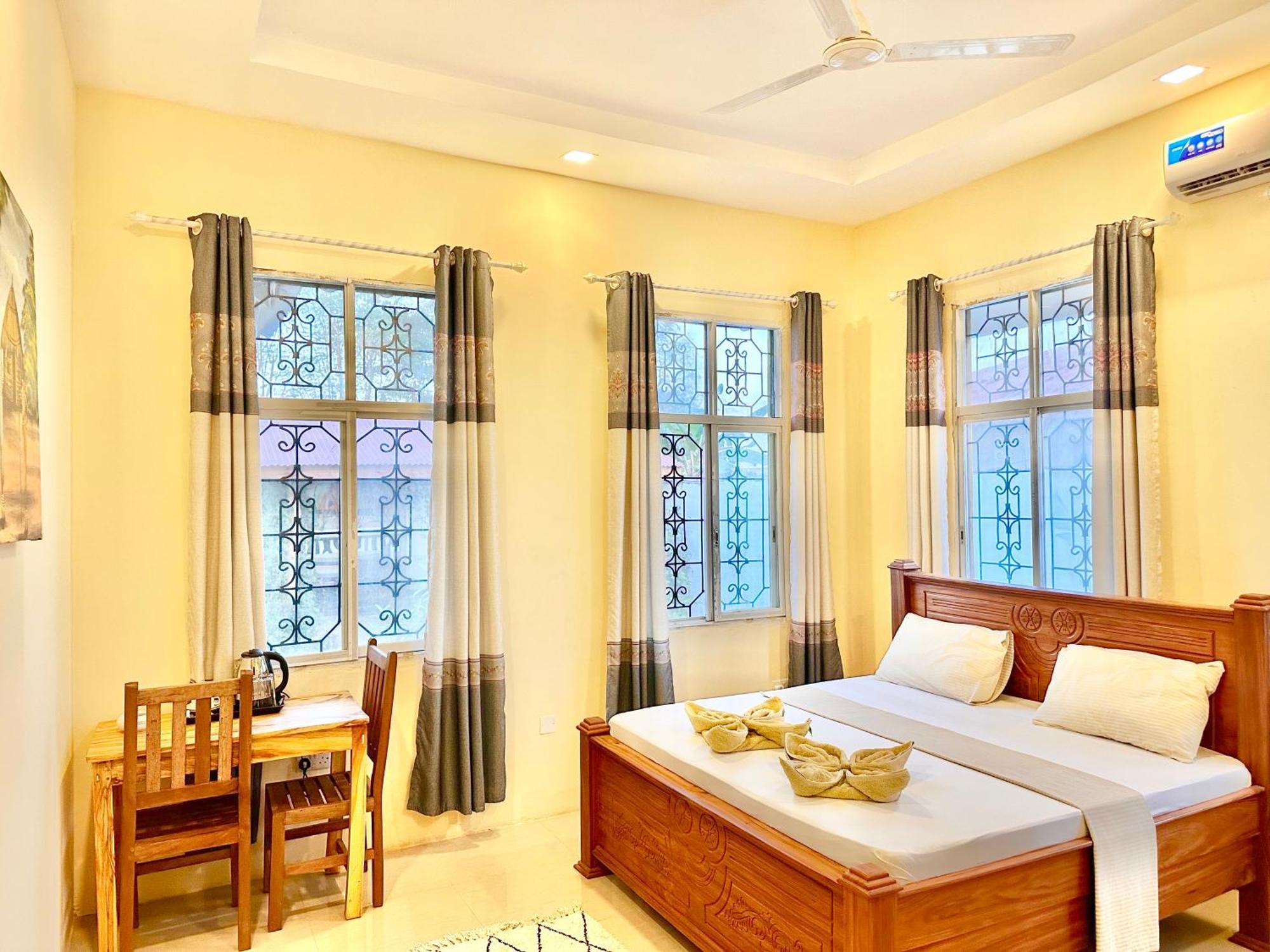 Garden Pearls Hotel นูงวี ภายนอก รูปภาพ