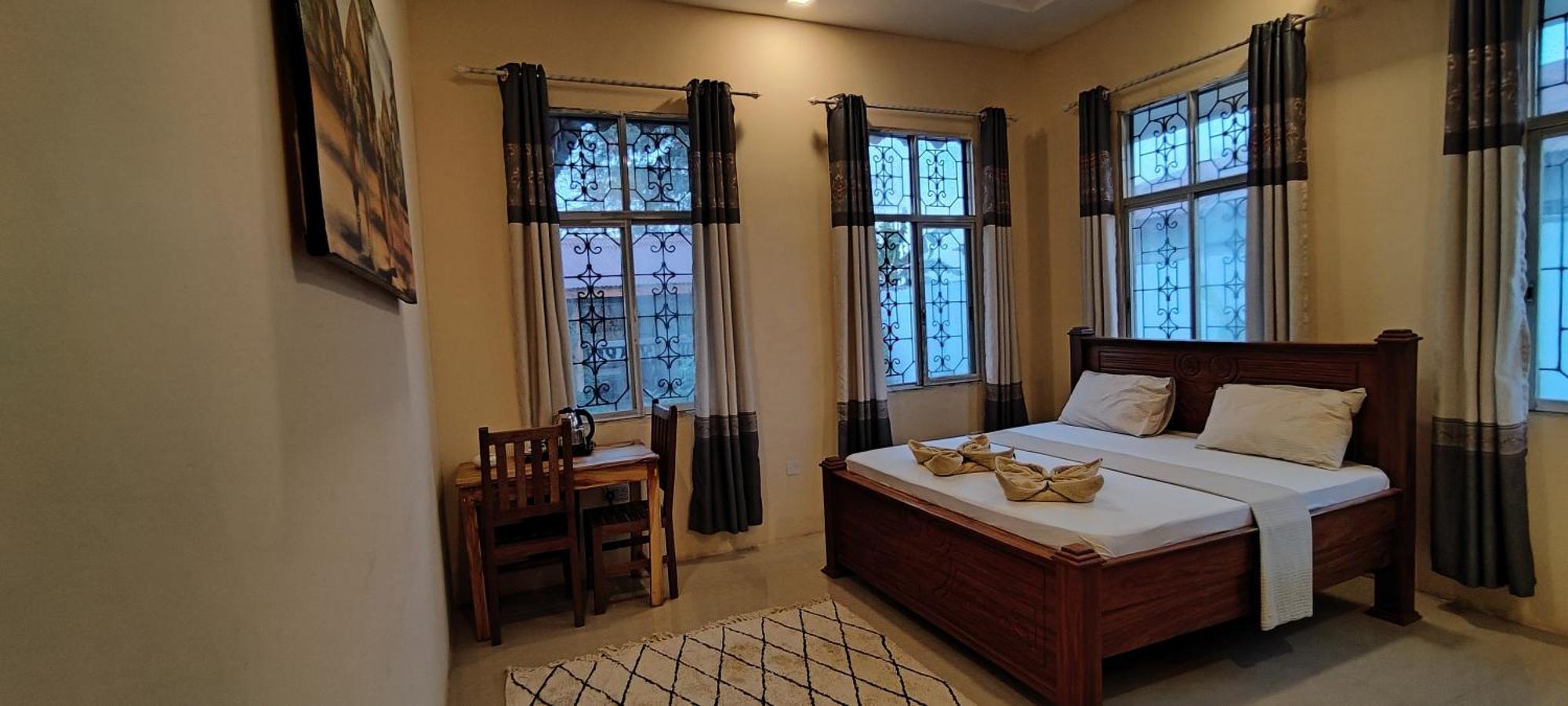 Garden Pearls Hotel นูงวี ภายนอก รูปภาพ