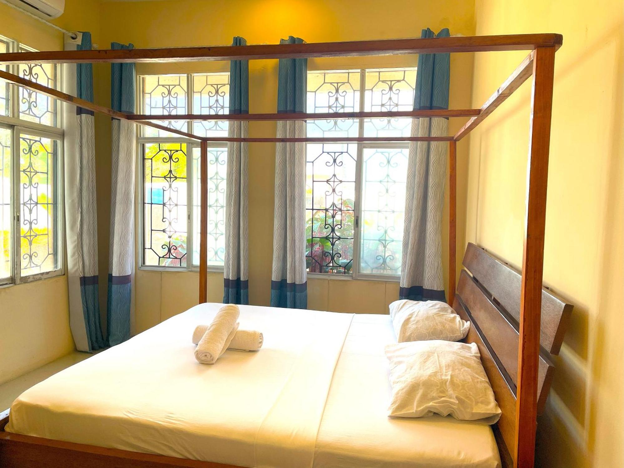 Garden Pearls Hotel นูงวี ภายนอก รูปภาพ